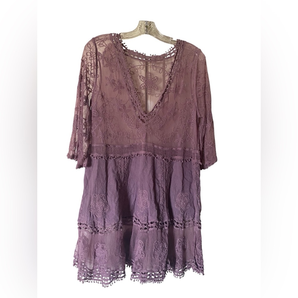 Beach Cover-up One Size. Has Some loose strings.